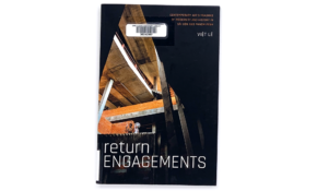 Book cover featuring a photograph of a building, in stark lighting.