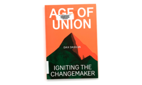 Book with cover design of a mountain above hills