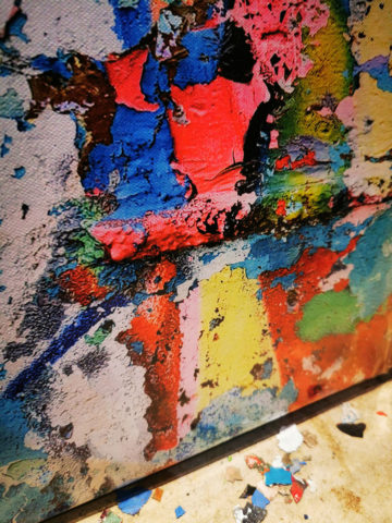 Flakes off canvas