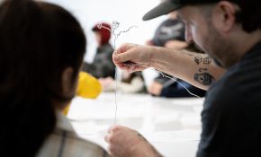 Animator Danny Guay right shows a student how to ply the wire