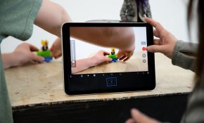 An iPad screen that shows a student's moving their figures into the frame