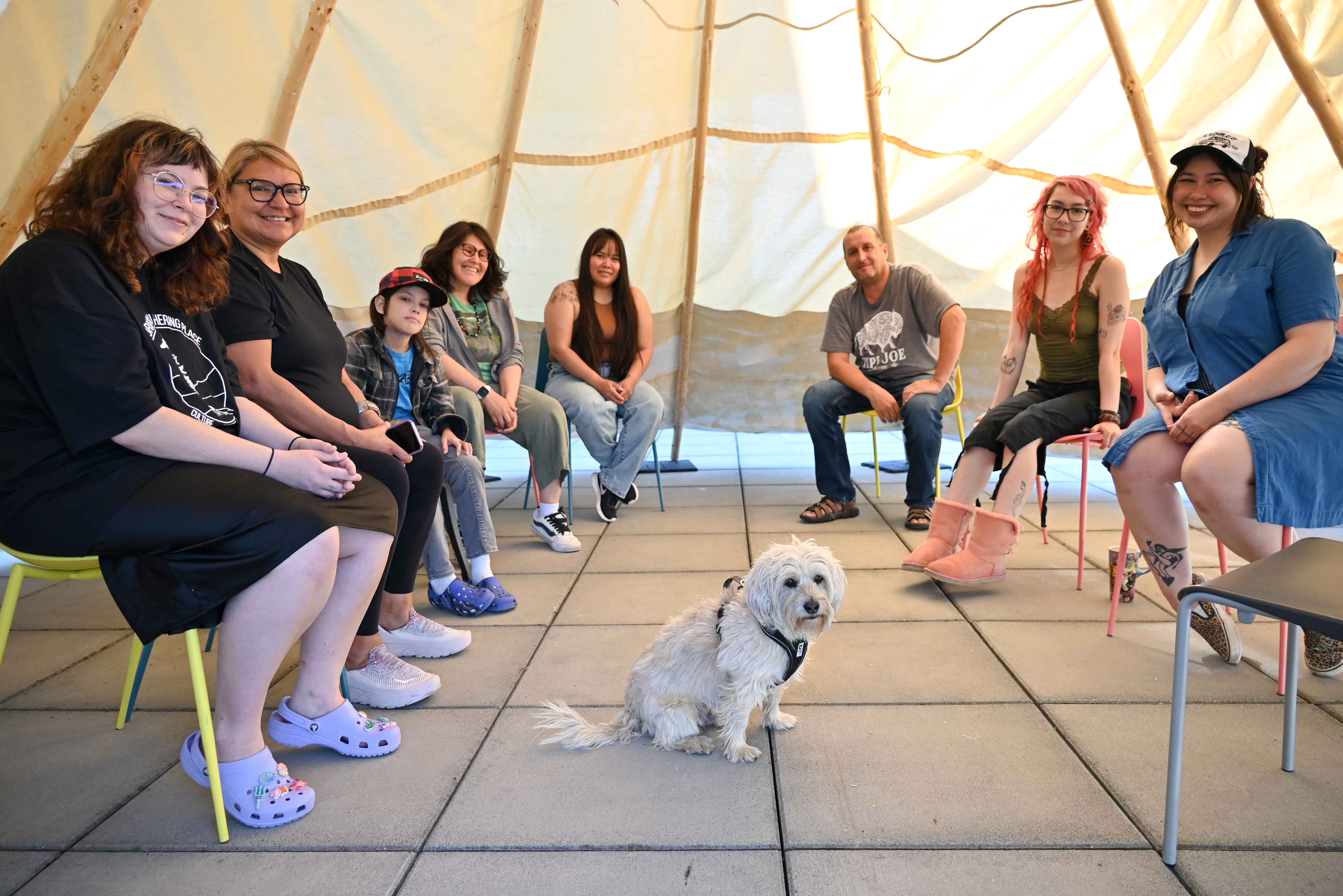(From L): Isabelle Jarman, Daina Warren, Talon Mitchell, Jennifer Mitchell, Alysha Johnny Hawkins, Tipi Joe, Sydney Mercredi, Leanne Inuarak-Dall and Julio the dog. (Photo by Sydney Pascal / courtesy the AGP)