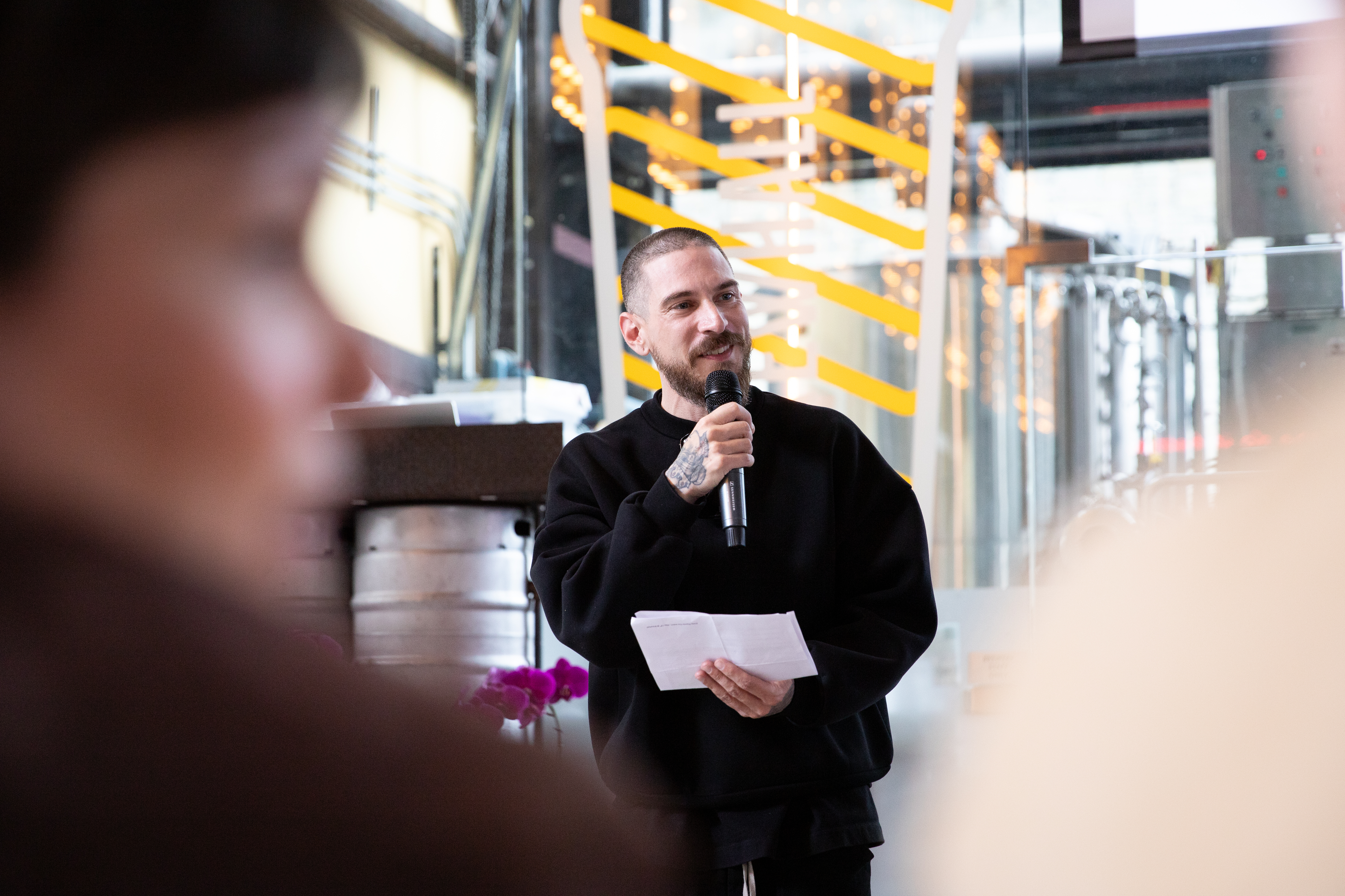 Justin Langlois introduces 2025's retirees. (Photo by Perrin Grauer)