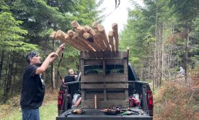 (From L): Tipi Joe loads the truck to bring the poles back to Vancouver. (Photo by Sydney Pascal / courtesy AGP)
