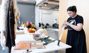 Leanne Inuarak-Dall sharpens a machete at the AGP. (Photo by Perrin Grauer)